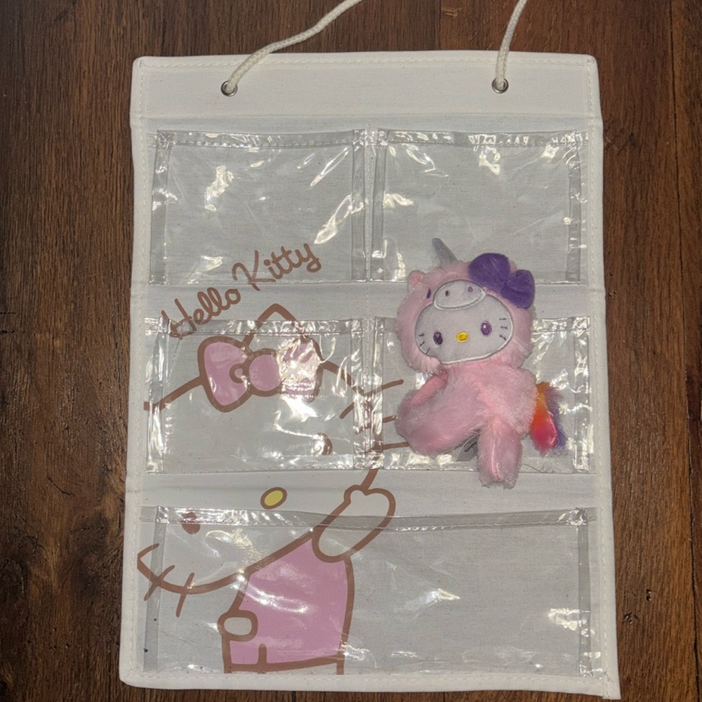 Hello Kitty Hanging organizer with plush huggable Hello Kitty unicorn costume.